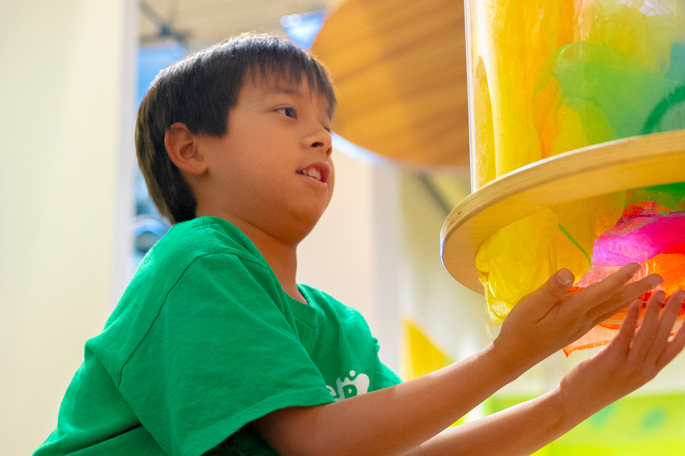 a young kid playing at Glazer Children's Museum