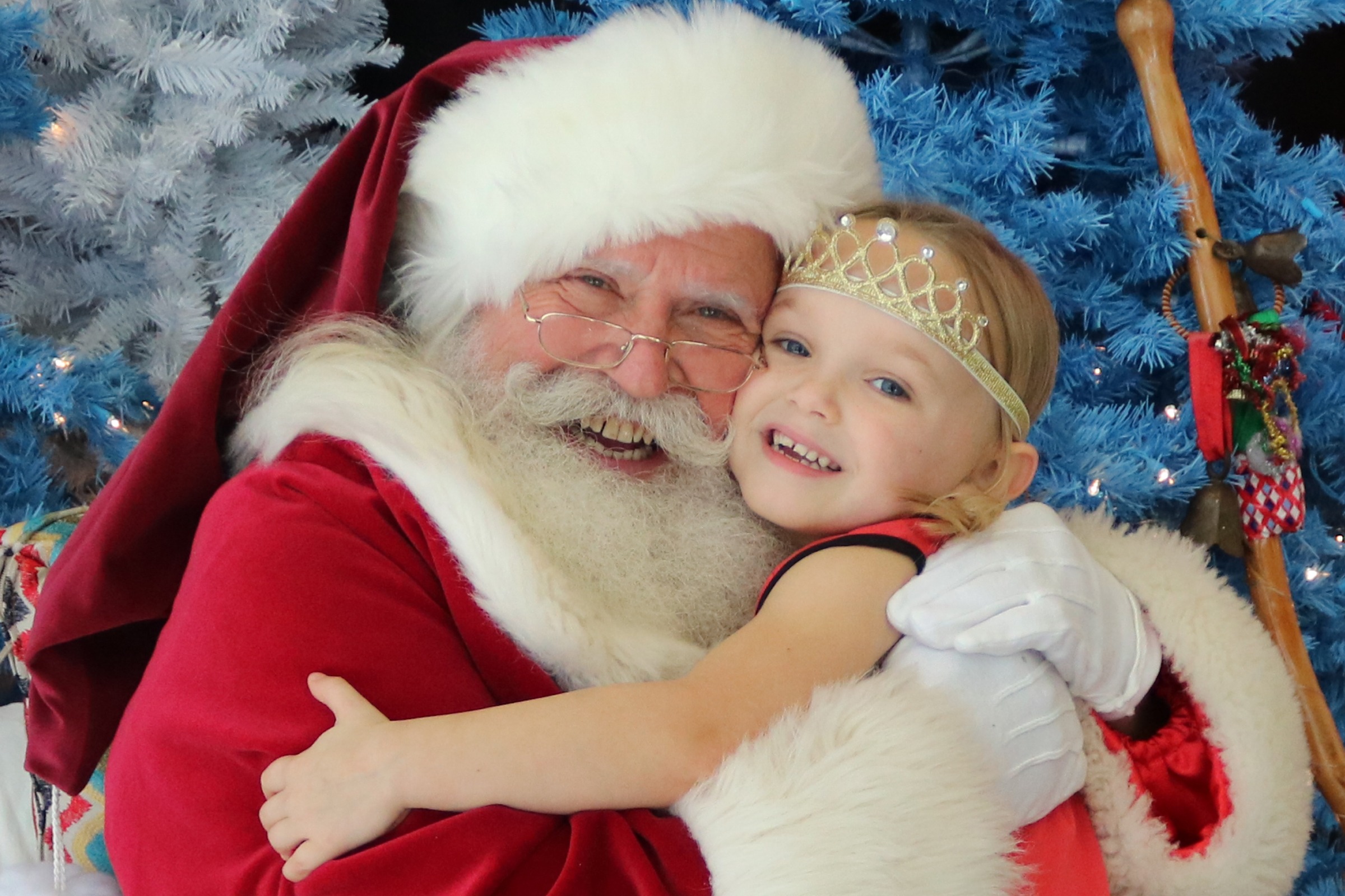Santa Claus hugging a little girl